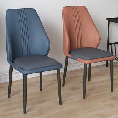 comprar Cadeiras de jantar personalizadas e estofadas Cadeira de jantar de interior de couro laranja Fabricação em linha